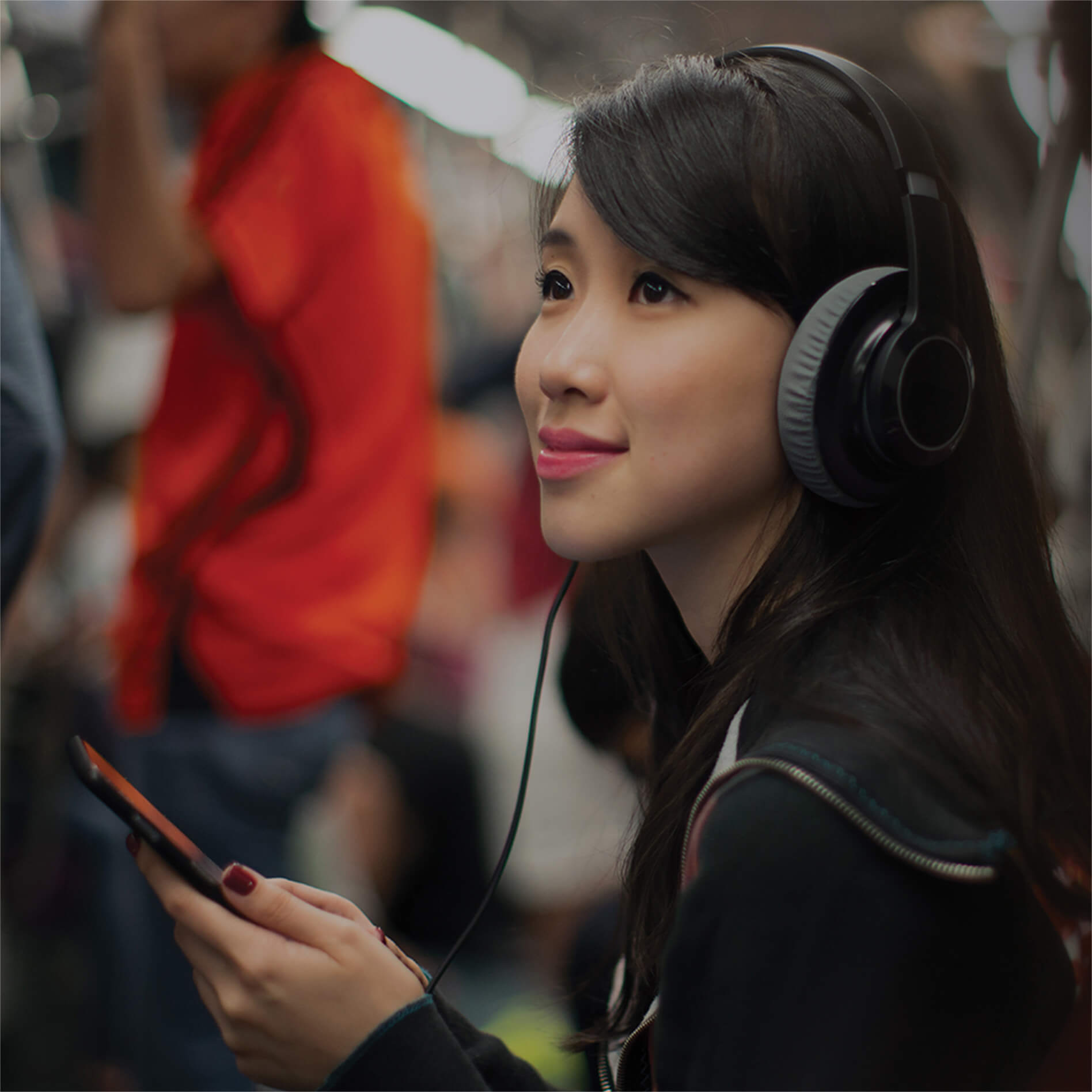 Photo of girl wearing headphones